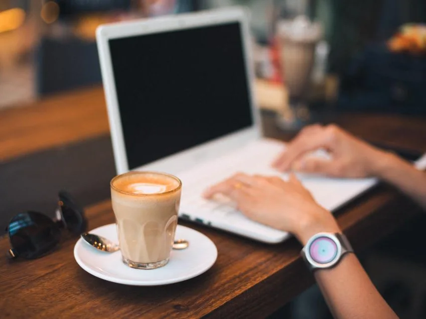 Verdant Café rebrand shown on a laptop beside a latte