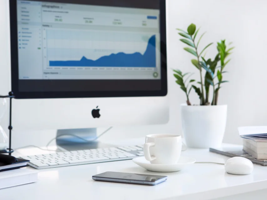 Desktop computer displaying website traffic analytics